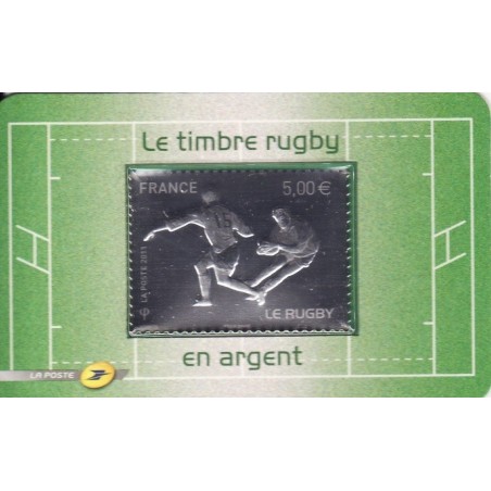 No597 - RUGBY - TIMBRE AUTOADHESIF EN ARGENT- AVEC SON SUPPORT.