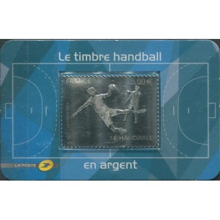 No738 - HANDBALL - TIMBRE AUTOADHESIF EN ARGENT - AVEC SUPPORT.